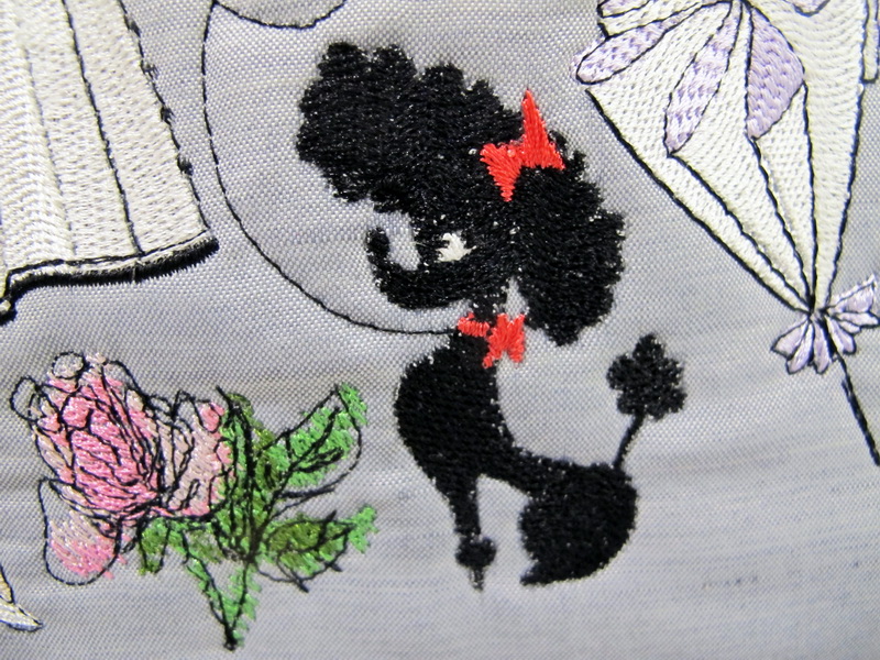 City Slicker Machine Embroidery Designs by Stitchingart. Bag with ladies, birds, eiffel tower roses and poodle.