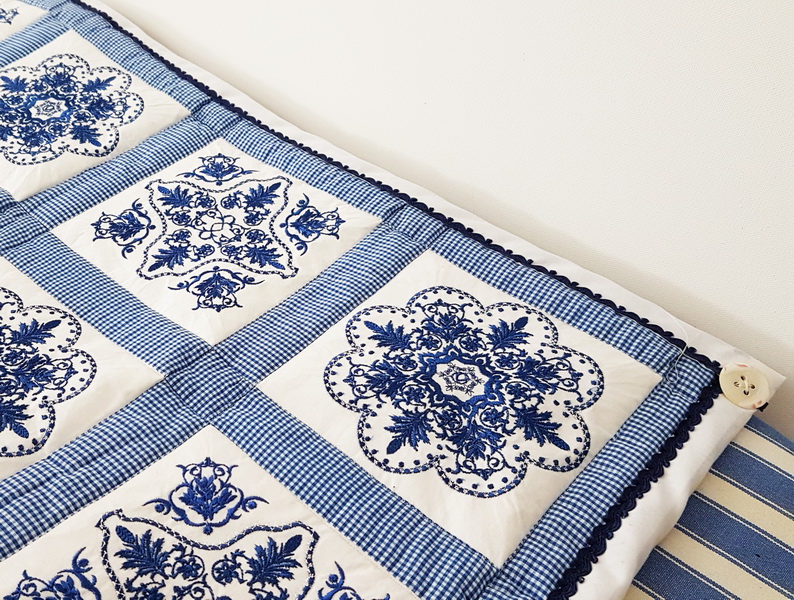 Panache Machine Embroidery Designs by Stitchingart. Patchwork floral blue and white quilt.