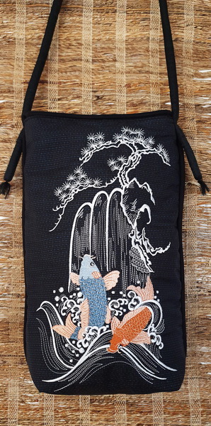 Spring of Life Machine Embroidery Design Bag. Black bag with Koi, waterfall and blossom tree