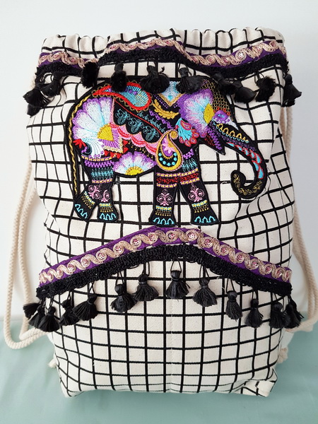 Wild and Free Machine Embroidery Designs by Stitchingart. Embroidered artistic colourful elephant cushion.