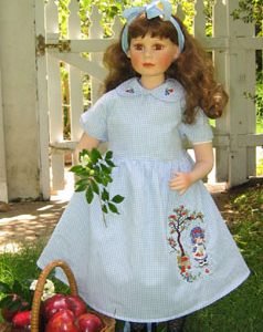 apple tree, squirrel, childrens dress, clothing, clock, apple shortcake character, bluebird, flowers, machine embroidery