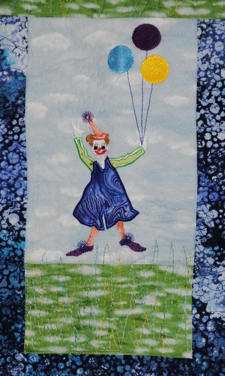 Hey Day Circus, machine embroidery designs, circus tent, flags, clown, juggling, balloons, elephant, giraffe, lion, hoop, daschund, dogs, seal, sleep my darling, teddy, unicycle, tiger wall hanging, blanket, children, fun