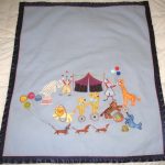 Hey Day Circus, machine embroidery designs, circus tent, flags, clown, juggling, balloons, elephant, giraffe, lion, hoop, daschund, dogs, seal, sleep my darling, teddy, unicycle, tiger wall hanging, blanket, children, fun