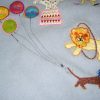 Hey Day Circus, machine embroidery designs, circus tent, flags, clown, juggling, balloons, elephant, giraffe, lion, hoop, daschund, dogs, seal, sleep my darling, teddy, unicycle, tiger wall hanging, blanket, children, fun