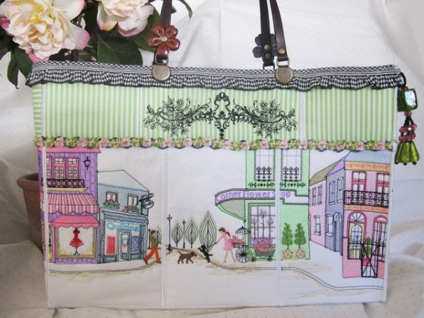 Main Street, machine embroidery designs, bag, handbag, terrace house, topairy, ladies walking, bike, bicycle, pizza, chef, restaurant, chairs, table, french, fashion, scooter, village, town, sewing shop, quilting, dogs, flowers, floral, flower shop, plants, trees, decorative, artistic, cushion, pillow, clothing, jumper, pull over