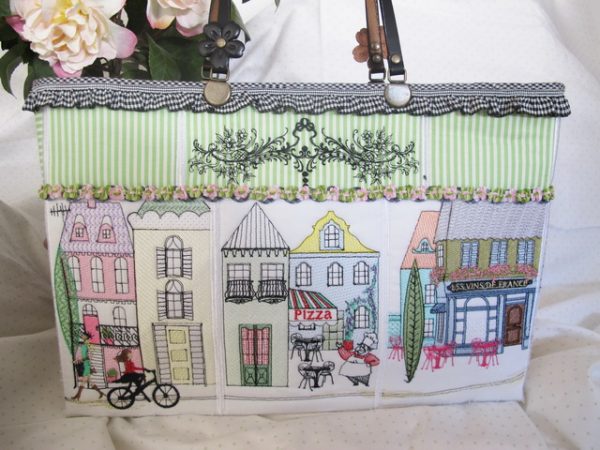 Main Street, machine embroidery designs, bag, handbag, terrace house, topairy, ladies walking, bike, bicycle, pizza, chef, restaurant, chairs, table, french, fashion, scooter, village, town, sewing shop, quilting, dogs, flowers, floral, flower shop, plants, trees, decorative, artistic, cushion, pillow, clothing, jumper, pull over