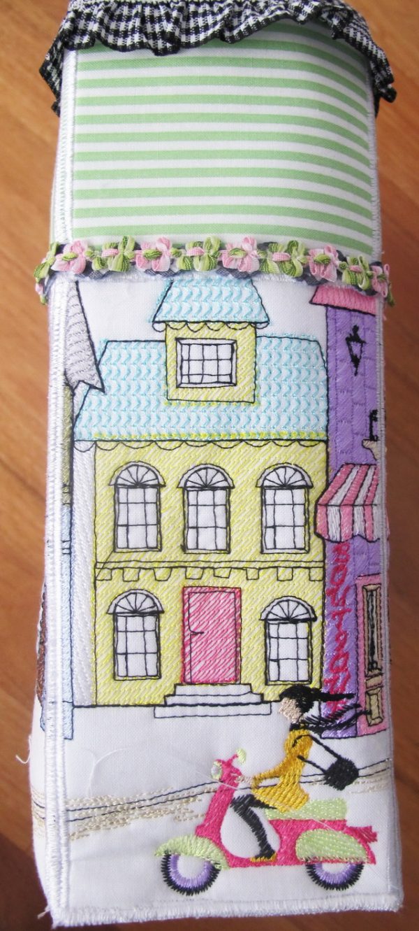 Main Street, machine embroidery designs, bag, handbag, terrace house, topairy, ladies walking, bike, bicycle, pizza, chef, restaurant, chairs, table, french, fashion, scooter, village, town, sewing shop, quilting, dogs, flowers, floral, flower shop, plants, trees, decorative, artistic, cushion, pillow, clothing, jumper, pull over