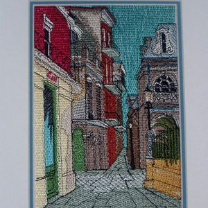 New Orleans, machine embroidery designs, Louisiana, America, USA, streets of New Orleans, patterns, fence, buildings, homes, terrace house, floral, flowers, decorative, artistic, tree, saxaphone, music, saxaphone musician, street lamp, vintage puffy dress, usa flag, boat, historic, piano, pianoist, topiary, pot, tree, bow, river, lillies, wall hanging, cushion, picture frame, pillow