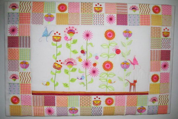 Wall Flowers, machine embroidery designs, artistic, decorative, patterns, cat, bird, ladybird, lady bird, flower, floral, flowers, stem, leaves, sunflower, finch, robin, leaves, bright flowers, colourful, patterns, garden, tulip, lady bug, ladybug, wall hanging, cushion, pillow, handbag, bag, purse, clothing, top. shirt, blouse, fashion, butterfly