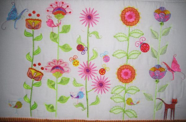 Wall Flowers, machine embroidery designs, artistic, decorative, patterns, cat, bird, ladybird, lady bird, flower, floral, flowers, stem, leaves, sunflower, finch, robin, leaves, bright flowers, colourful, patterns, garden, tulip, lady bug, ladybug, wall hanging, cushion, pillow, handbag, bag, purse, clothing, top. shirt, blouse, fashion, butterfly