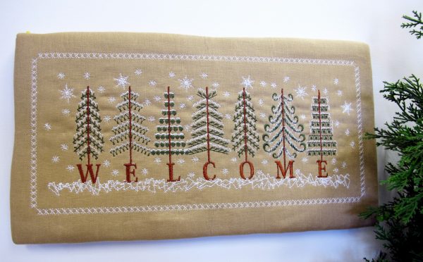 Welcome, machine embroidery designs, Christmas, Holiday Christmas tree, snow, icicles, snow flakes, snowflakes, pine trees, decorations. wall hanging, home decor, artistic, decorative, patterns