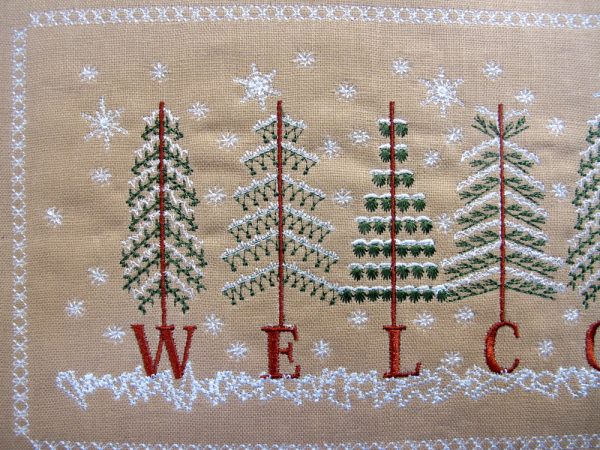 Welcome, machine embroidery designs, Christmas, Holiday Christmas tree, snow, icicles, snow flakes, snowflakes, pine trees, decorations. wall hanging, home decor, artistic, decorative, patterns