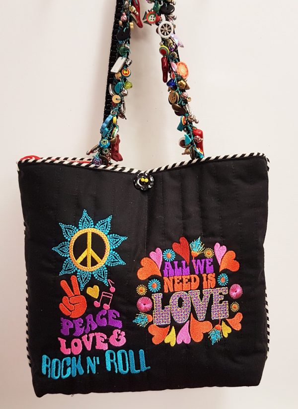 Hippy Chick, machine embroidery designs, bag, handbag, fashion, hippy, 1970's, 1970's fashion, 1970, 1970 fashion, dress, boots, short dress, leopard print, bell bottoms, models, peace, peace sign, peace fingers, music note, love heart, heart, peace love and rock and roll, rock and roll, all we need is love, flowers, floral, sun, artistic, decorative, patterns, trinkets